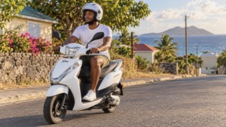 An Eazy Importz scooter on a Statia road